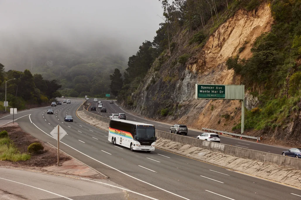 Marin Airporter shuttle driving through the scenic hills and fog of Marin County